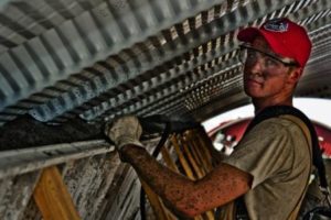 Worker holding machinery