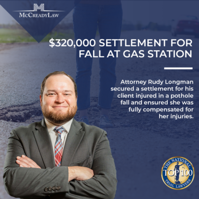 Rudy Longman in a suit smiles, with text about a $320,000 settlement for a gas station fall. Logo of The National Trial Lawye